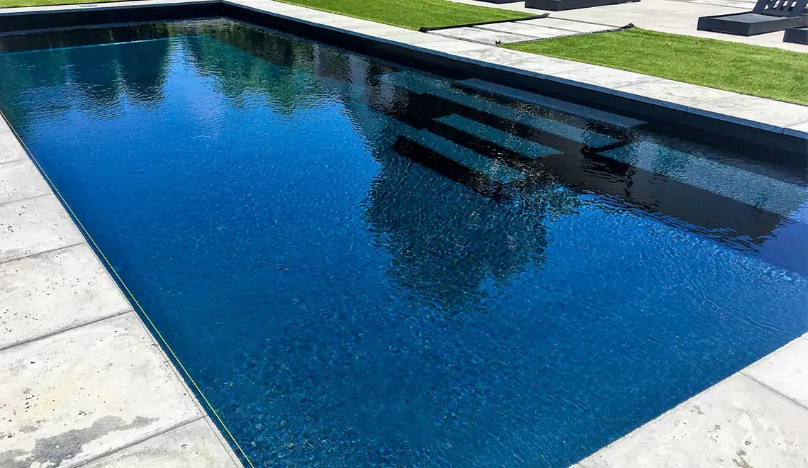 The Grand rectangular fiberglass pool with great side entry steps from Leisure Pools Athens